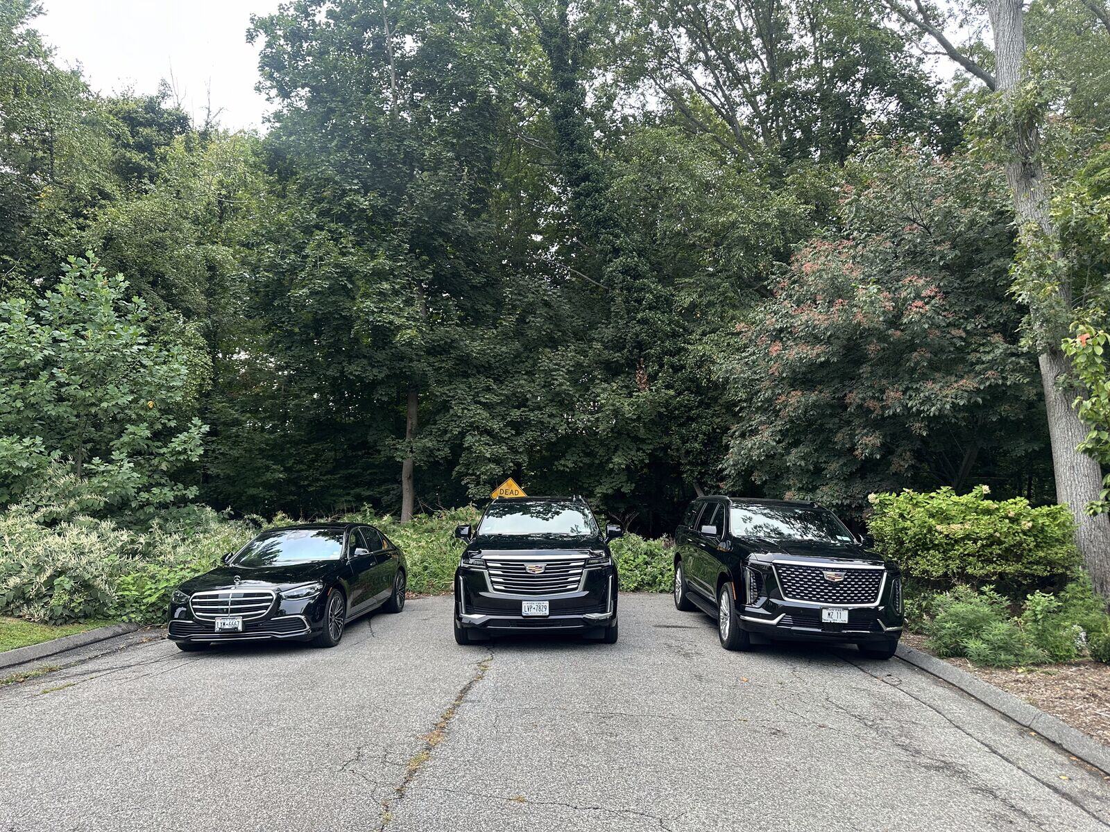 Black Cadillac business sedan